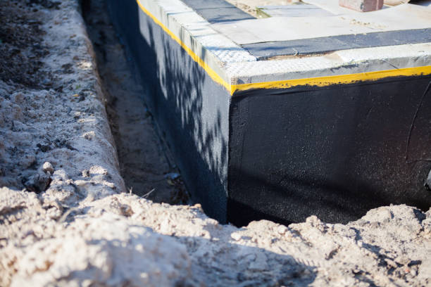 Professional Waterproofing technician working in Magnolia, NJ